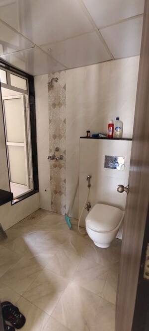 Bathroom in 1 BHK Apartment at Unique Aurum, Mira Road – for Rent