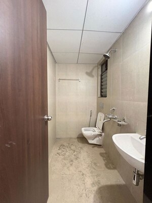 Bathroom in 2 BHK Apartment at Runwal Gardens, Dombivli East – for Rent
