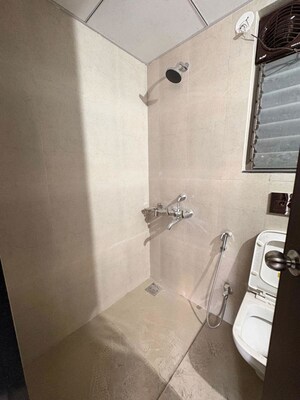 Bathroom in 2 BHK Apartment at Runwal Gardens, Dombivli East – for Rent
