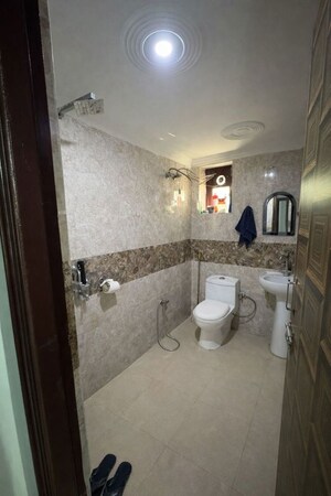 Bathroom in 3 BHK Builder Floor at Gulmohar Park – for Sale