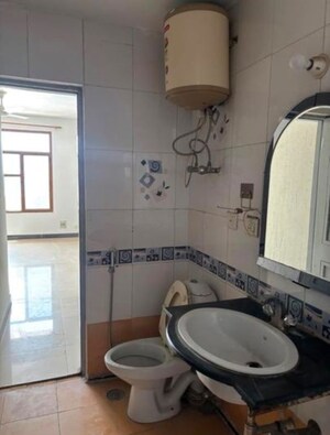 Bathroom in 3 BHK Apartment at CGHS HEWO Apartments, Sector 56 – for Rent