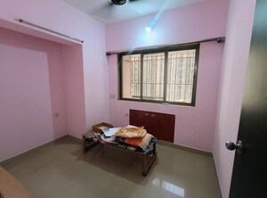 Living Room in 2 BHK Apartment at Runwal Garden City, Balkum Pada – for Sale