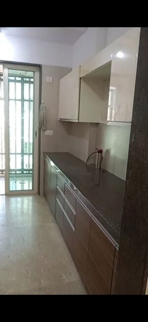 Kitchen in 3 BHK Apartment at The Wadhwa Anmol Pride, Goregaon West – for Rent