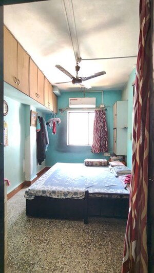 Bedroom in 2 BHK Apartment at Mittal Apartment, Thakurli – for Sale