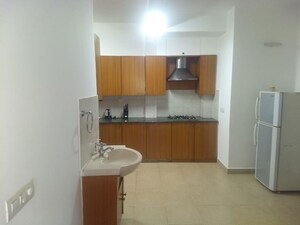Kitchen in 3 BHK Apartment at Rose Ville, Richmond Town – for Rent