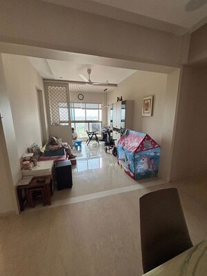 Living Room in 4 BHK Apartment at Raj Infinia, Malad West – for Sale