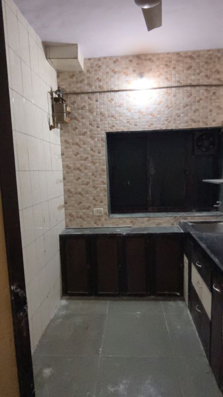 Kitchen, lok-puram 1 Bedroom 565 Sq.Ft. Apartment In Vasant Vihar Thane 10451850