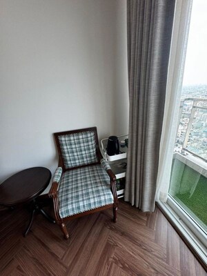 Living Room in 4 BHK Apartment at Ambience Tivertone, Sector 50 – for Rent