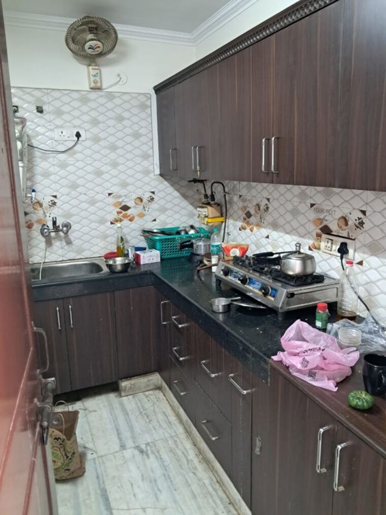 Kitchen, amar colony 2 Bedroom 900 Sq.Ft. Builder Floor In Amar Colony Delhi 10451926