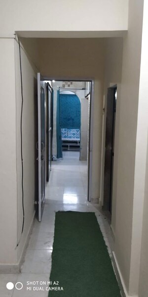 Building Lobby in 2 BHK Apartment at Mahavir Nagari Towers CHS, Kalyan West – for Sale