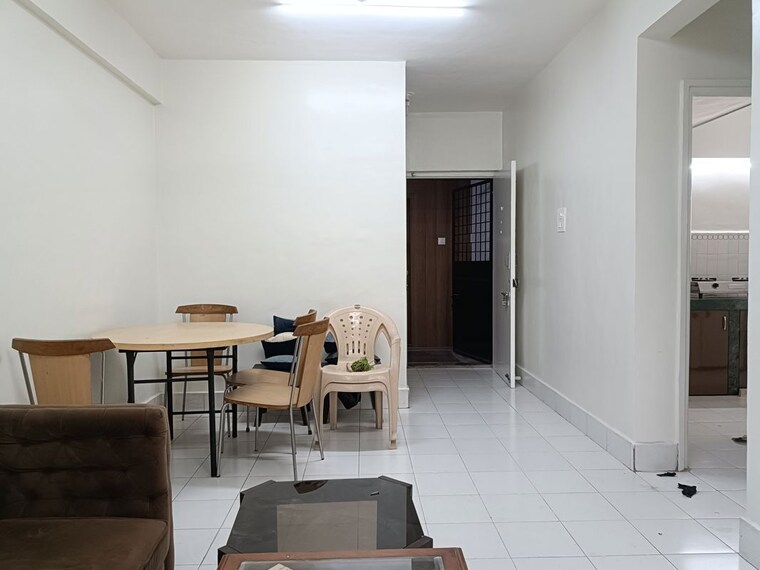 Living Room, ramesh-hermes-heritage-phase-2 1 Bedroom 650 Sq.Ft. Apartment In Shastrinagar Pune 10452074