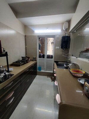 Kitchen in 2 BHK Apartment at Dosti Oak, Kolshet Industrial Area – for Sale