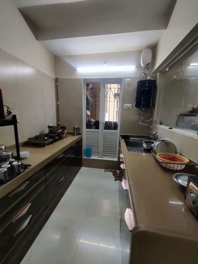 Kitchen, dosti-oak 2 Bedroom 639 Sq.Ft. Apartment In Kolshet Industrial Area Thane 10452108