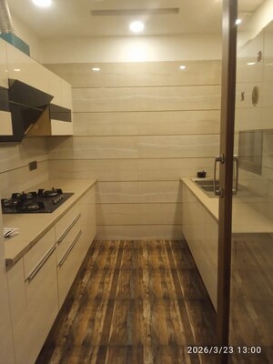 Kitchen in 3 BHK Builder Floor at Sushant Lok I – for Sale