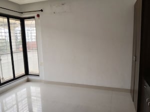 Room in 2 BHK Apartment at Satguru Solitaire, Thane West – for Rent