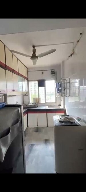 Kitchen in 2 BHK Apartment at Mahavir Darshan Kandivali, Kandivali West – for Rent