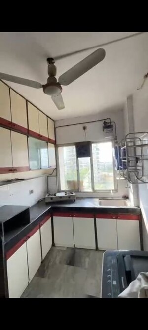 Kitchen in 2 BHK Apartment at Mahavir Darshan Kandivali, Kandivali West – for Rent