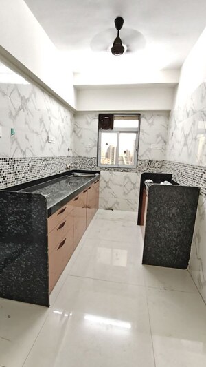 Kitchen in 1 BHK Apartment at DGS Sheetal Tapovan, Malad East – for Rent