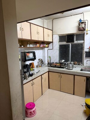 Kitchen in 2 BHK Apartment at Riddhi Garden, Malad East – for Rent