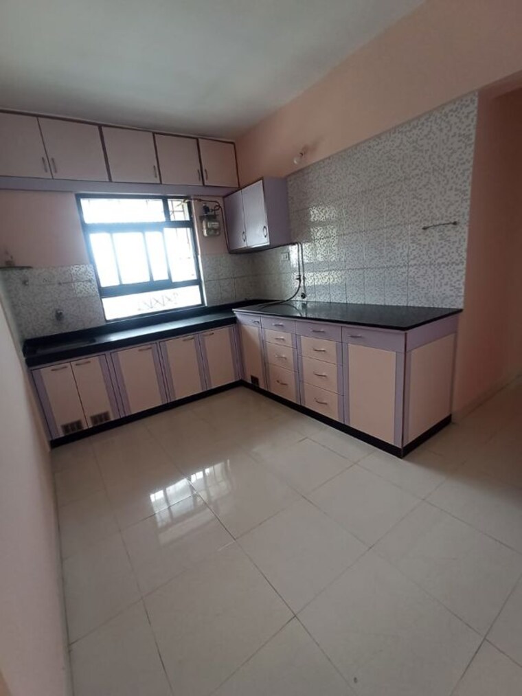 Kitchen, popular-colony-apartment 2 Bedroom 857 Sq.Ft. Apartment In Warje Pune 10452433