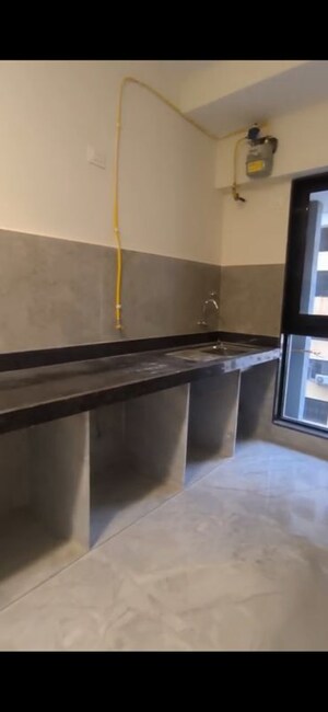 Kitchen in 1 BHK Apartment at Ajmera Boulevard, Malad West – for Sale