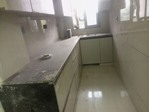 Kitchen in 1 RK Apartment at Sarin Farm CHS, Habibpur – for Rent