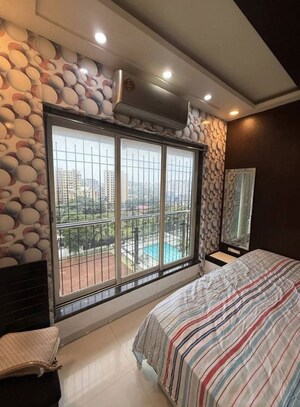 Bedroom in 2 BHK Apartment at Divyam Heights, Andheri West – for Rent