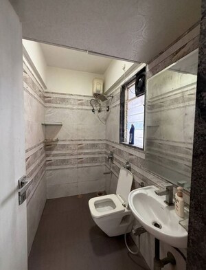 Bathroom in 2 BHK Apartment at Divyam Heights, Andheri West – for Rent