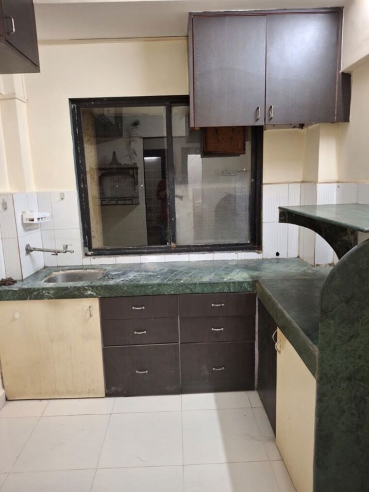 Kitchen, rna-ng-regency-phase-i 1 Bedroom 600 Sq.Ft. Apartment In Balkum Pada Thane 10452534