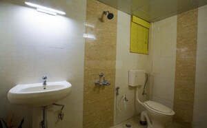 Bathroom in 3 BHK Apartment at High Grounds – for Sale