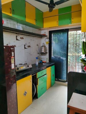 Kitchen in 2.5 BHK Apartment at Kalpana CHS Tilak Nagar, Tilak Nagar – for Rent