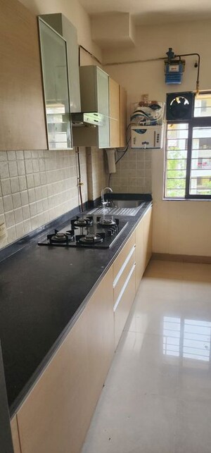 Kitchen in 2 BHK Apartment at Kalpataru Splendour, Wakad – for Rent