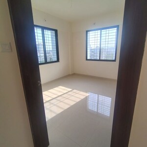 Room in 2 BHK Apartment at Shree Anand Royal Court, Thergaon – for Rent
