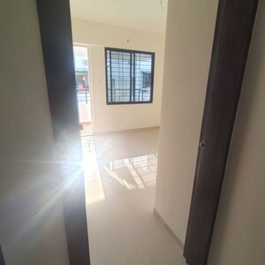 Room in 2 BHK Apartment at Shree Anand Royal Court, Thergaon – for Rent