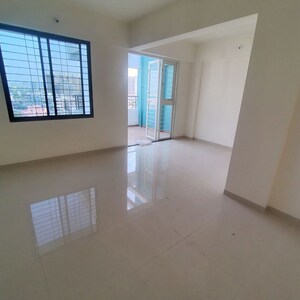Room in 2 BHK Apartment at Shree Anand Royal Court, Thergaon – for Rent