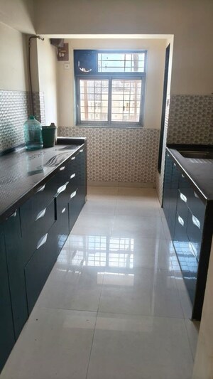 Kitchen in 2 BHK Apartment at Flying Kite, Bhandup West – for Sale