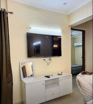 Tv Room in 2 BHK Apartment at Affinity Greens, International Airport Road – for Rent