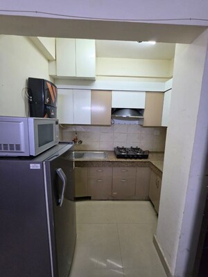 Kitchen in 1 RK Apartment at Logix Blossom Zest, Sector 143 – for Rent