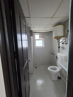 Bathroom in 1 RK Apartment at Logix Blossom Zest, Sector 143 – for Rent