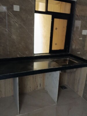 Kitchen in 1.5 BHK Apartment at DGS Sheetal Regalia, Borivali East – for Sale