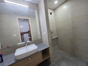 Bathroom in 1 RK Apartment at Gaur Runway Suites, Gaur Yamuna City – for Rent