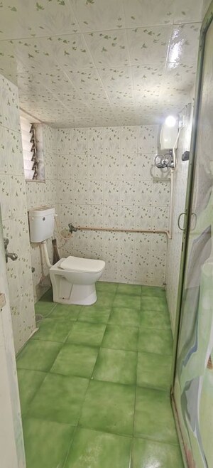 Bathroom in 1 BHK Apartment at Asmita Jyoti CHS, Malad West – for Rent