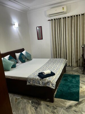 Bedroom in 4 BHK Builder Floor at Greater Kailash I – for Rent