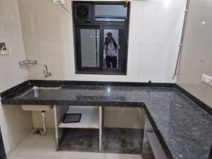 Kitchen in 1 BHK Apartment at Dosti Desire Joy, Brahmand – for Rent