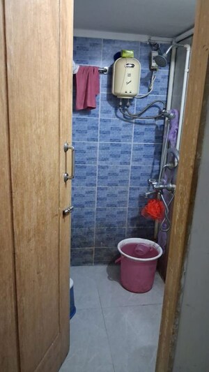 Bathroom in 1 BHK Apartment at Omkar Vayu, Mahim – for Rent