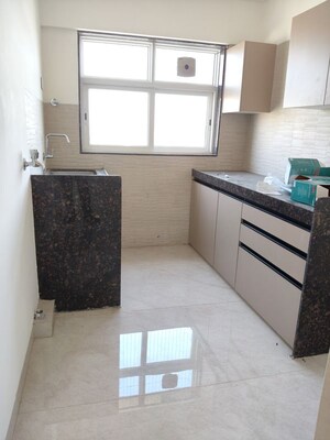 Kitchen in 2 BHK Apartment at Dev Leo Tower, Oshiwara – for Rent