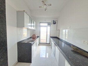 Kitchen in 2 BHK Apartment at Rustomjee Azziano Wing E, Thane West – for Sale