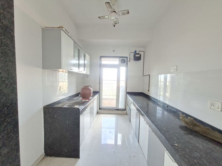 Kitchen, rustomjee-azziano-wing-e 2 Bedroom 848 Sq.Ft. Apartment In Thane West Thane 10453239