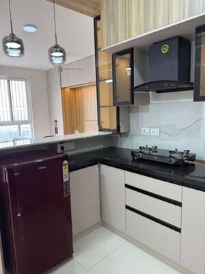 Kitchen in 1 RK Apartment at Brigade Cornerstone Utopia, Varthur – for Rent