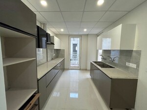 Kitchen in 3 BHK Apartment at Motia Blue Ridge, Dhakoli – for Sale